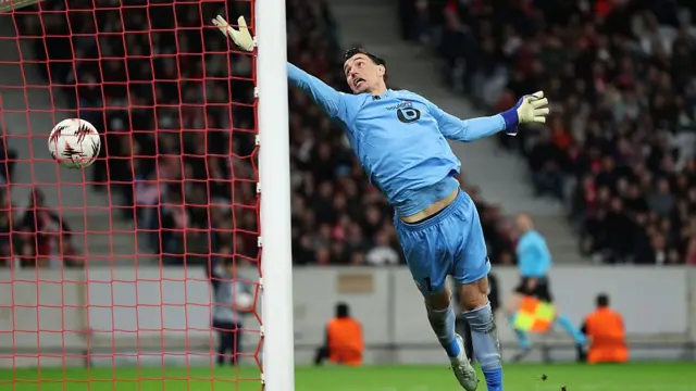 : Berke Ozer of LOSC Lille fails to save a shot from Ollie Watkins of Aston Villa