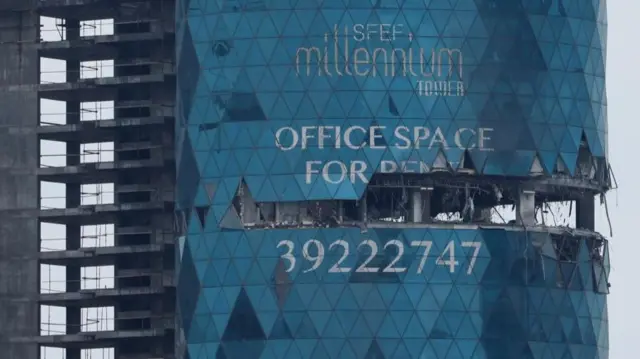 This picture, taken on Tuesday, shows damage to a tower in Manama, Bahrain