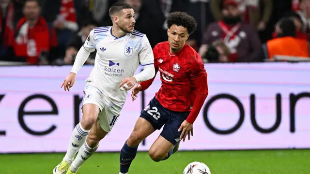 Emiliano Buendia of Aston Villa FC , Tiago Santos of Lille OSC