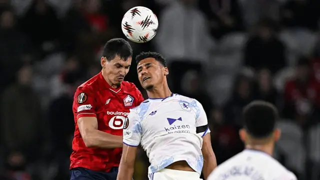 Aissa Mandi of Lille OSC , Ollie Watkins of Aston Villa FC