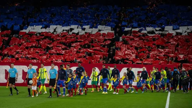 Palace and AEK Larnaca come out of the tunnel in Palace's first home game in Europe in October