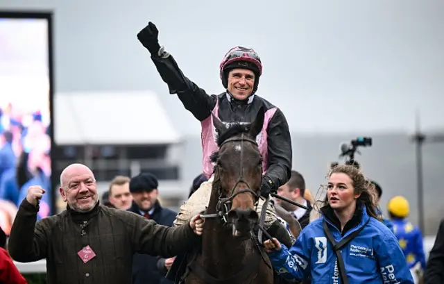 Jockey Harry Skelton celebrates on Supremely West