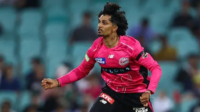 Jafer Chohan of the Sixers bowls during the BBL match between Sydney Sixers and Adelaide Strikers