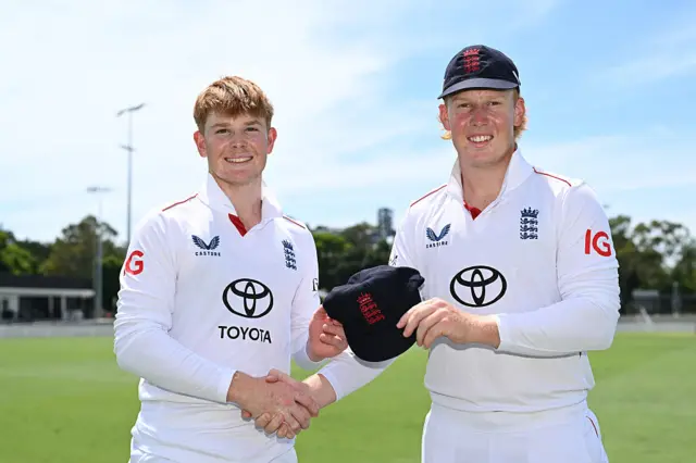 Thomas Rew of the England Lions poses with his brother James Rew