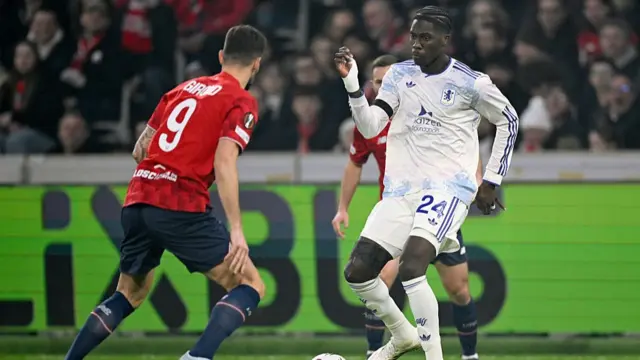 ) Olivier Giroud of Lille OSC , Amadou Onana of Aston Villa F