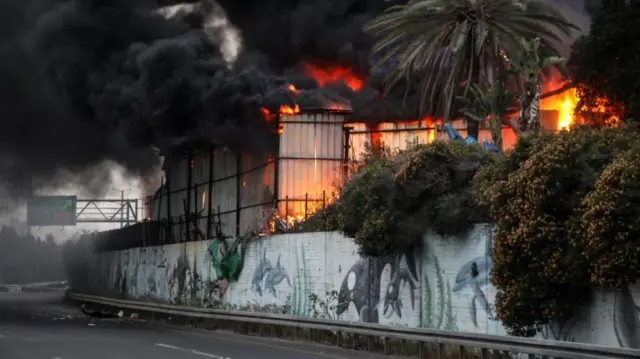 Fire engulfs a building
