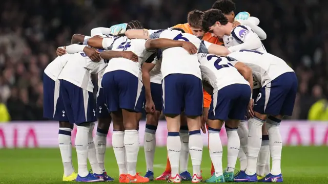 Tottenham players in a huddle