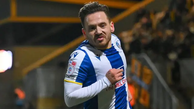 Jack Payne celebrating a goal for Colchester United