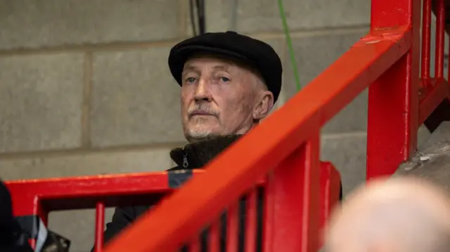 Ian Holloway looking glum in the stands