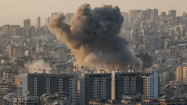 Smoke rises after Israeli strikes on Beirut, 12 March