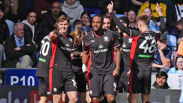 Southampton players celebrate Flynn Downes' goal at Coventry