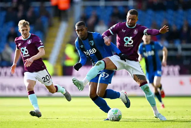 Rayan of AFC Bournemouth is challenged by Kyle Walker