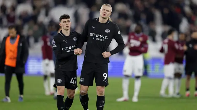 Manchester City's Phil Foden and Erling Haaland