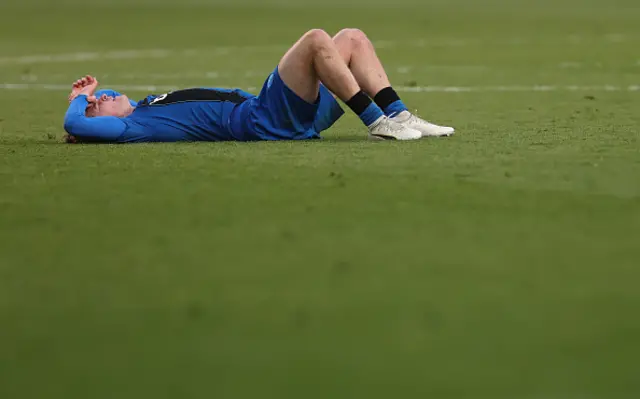 Alex Scott of AFC Bournemouth looks dejected