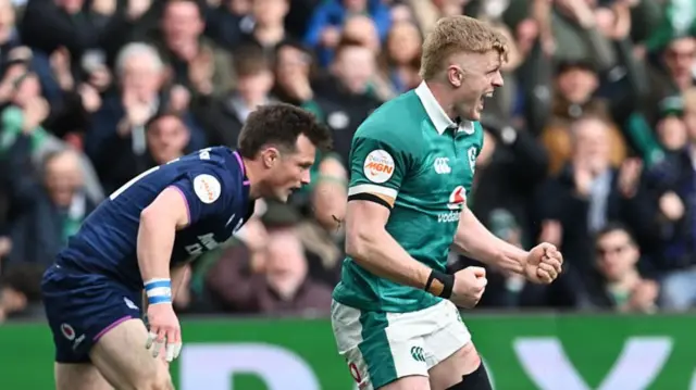 Tommy O'Brien celebrates for Ireland against Scotland