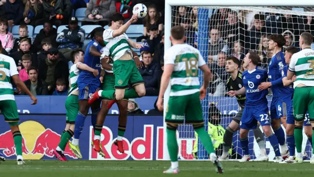 Ronnie Edwards heads QPR's third goal at Leicester