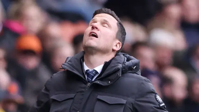 Gary Caldwell looks to the heavens on the touchline