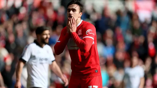 David Strelec claps his face after a chance goes begging