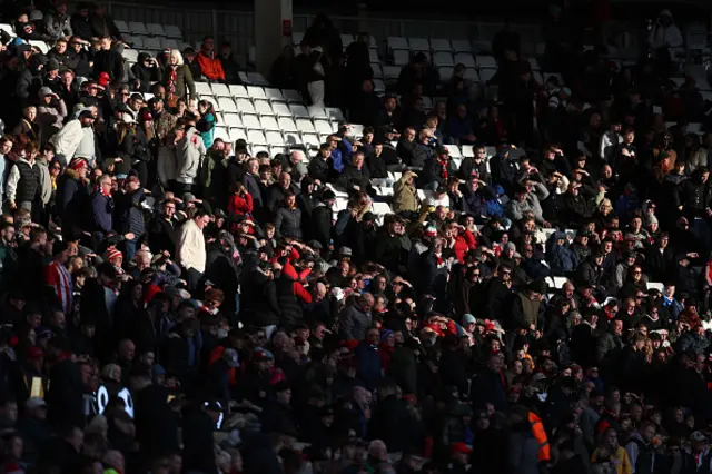 Sunderland fans are seen leaving the stadium