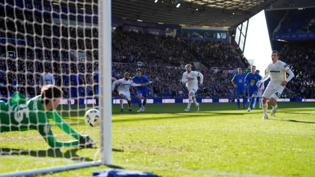 James Beadle dives to save Sydie Peck's penalty