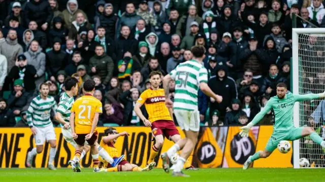 Hyun-jun Yang scores for Celtic in the first half against Motherwell