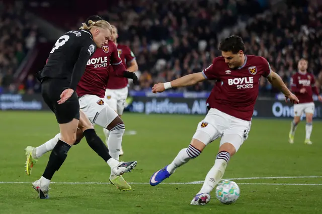Haaland attempts a shot for Manchester City