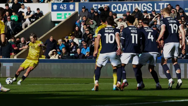 Blackburn's Todd Cantwell sends in a free-kick against Milwall