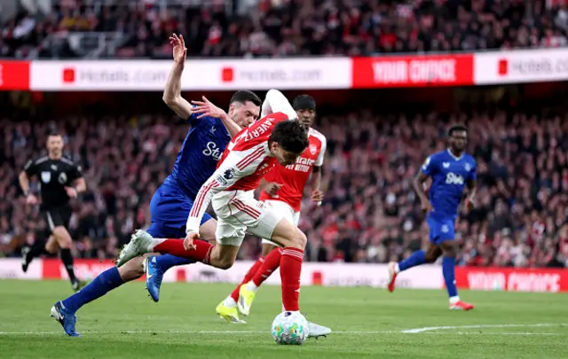 Kai Havertz of Arsenal is challenged by Michael Keane