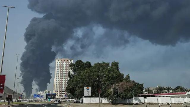 Smoke rises from the direction of an energy installation in the Gulf emirate of Fujairah.