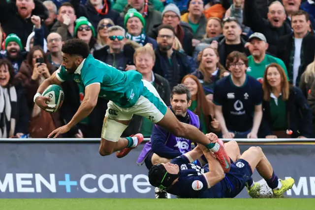 Robert Baloucoune of Ireland dives in to scores his team's third try