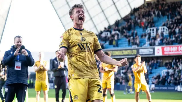 Blackburn's Mathias Jorgensen celebrates in front of the Blackburn fans at The Den