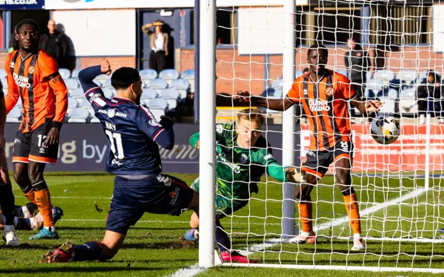 Dundee's Ashley Hay scores