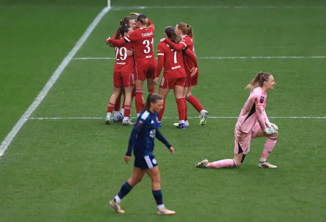 Beata Olsson of Liverpool celebrates scoring her team's first goal