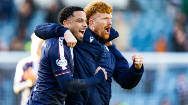 Dundee's Ashley Hay and Simon Murray celebrate