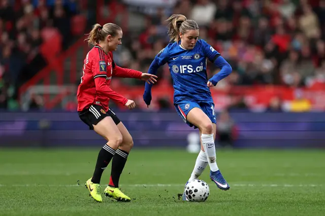 Wieke Kaptein of Chelsea is challenged by Lisa Naalsund of Manchester United