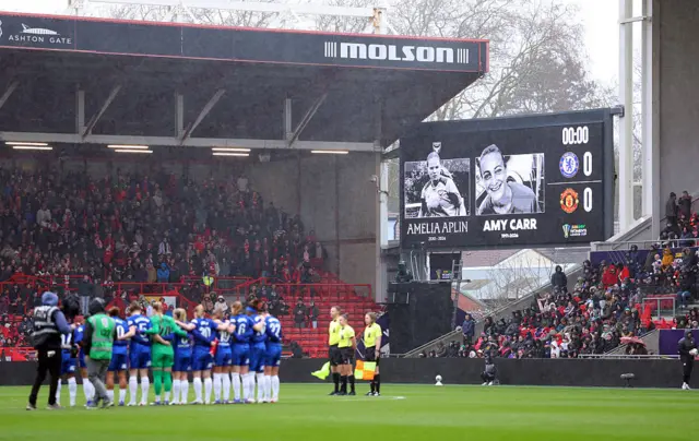 Players of Chelsea stand in a minutes silence in memory of Amelia Aplin and Amy Carr prior to the Subway Women's League Cup Final match between Chelsea and Manchester United at Ashton Gate on March 15, 2026 in Bristol, England.