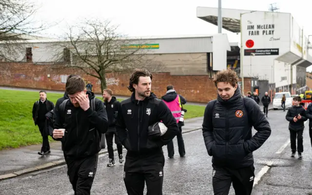 Ryan Strain, Will Ferry and Julius Eskesen walk along Tannadice Street