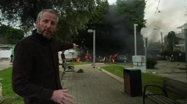 BBC reporter Jon Donnison at scene of Israeli strike in Tel Aviv