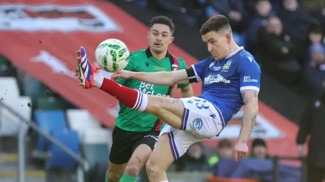 Action from Glentoran v Linfield