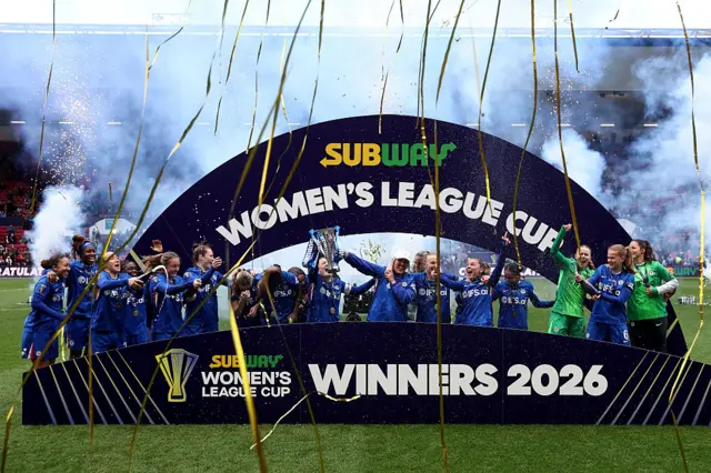 Players of Chelsea pose for a photo with the Subway Women's League Cup trophy