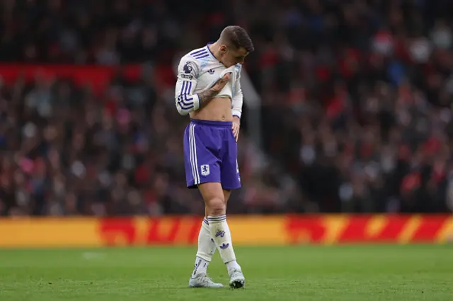 Lucas Digne of Aston Villa looks dejected