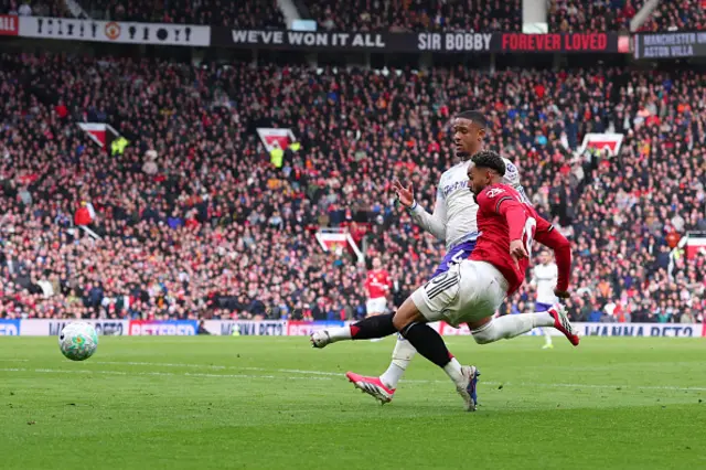 Matheus Cunha of Manchester United scores