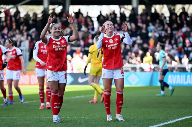 Olivia Smith of Arsenal celebrates scoring her team's first goal with teammate Chloe Kelly
