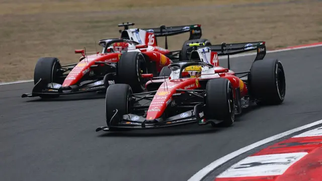 Charles Leclerc and Lewis Hamilton battling on track