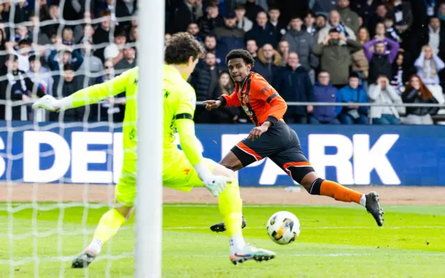 Dundee's Jon McCracken saves from Amar Fatah