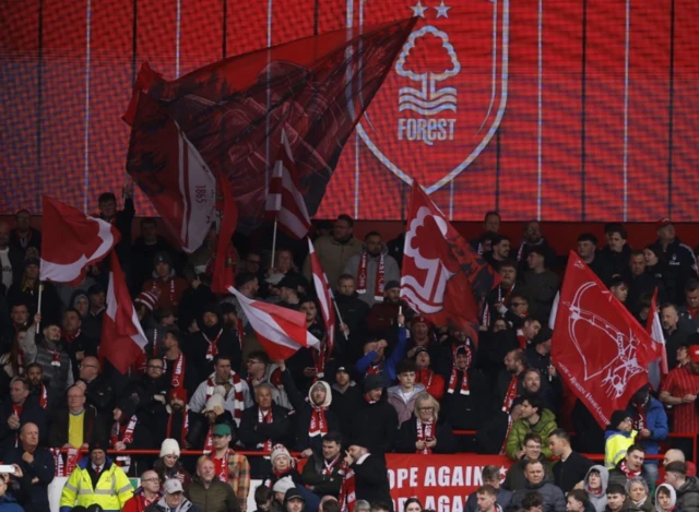 Nottingham Forest fans wave flags inside the stadium