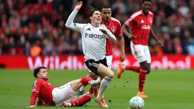 Neco Williams fouls Harry Wilson