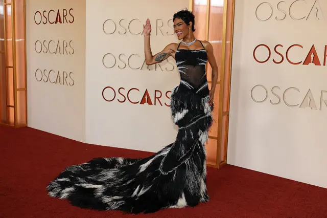 Teyana Taylor in a floor-length black and white gown