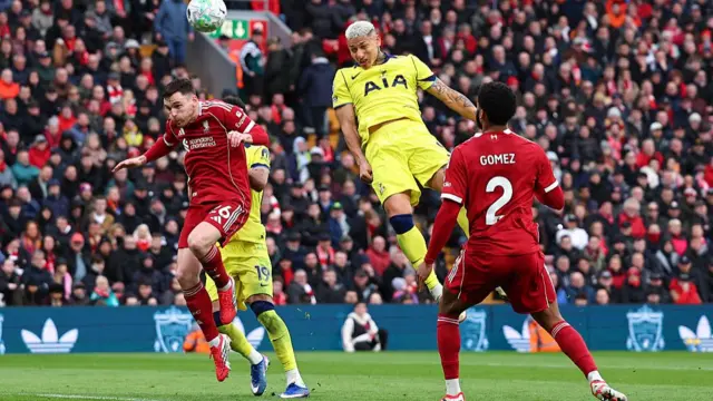 Richarlison heads wide for Tottenham.
