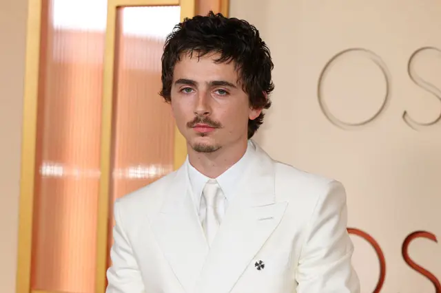 Timothee Chalamet in an all-white suit